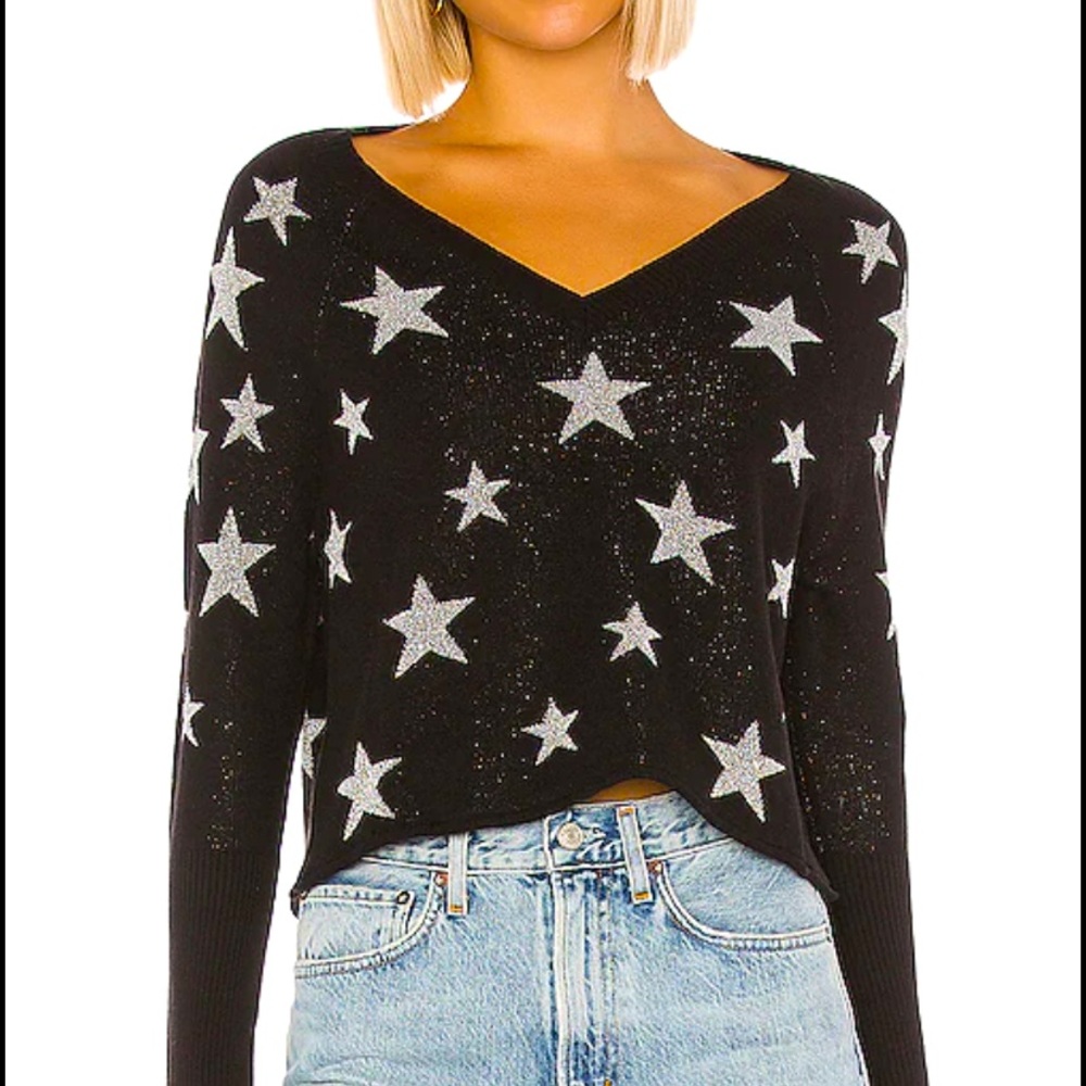 Chaser sweater. Size small. Black/silver stars.